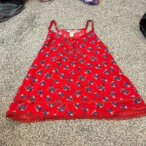 Red flower patterned tank top with crochet bottom